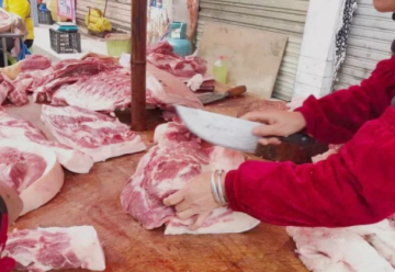 养殖企业称卖一头猪亏300元